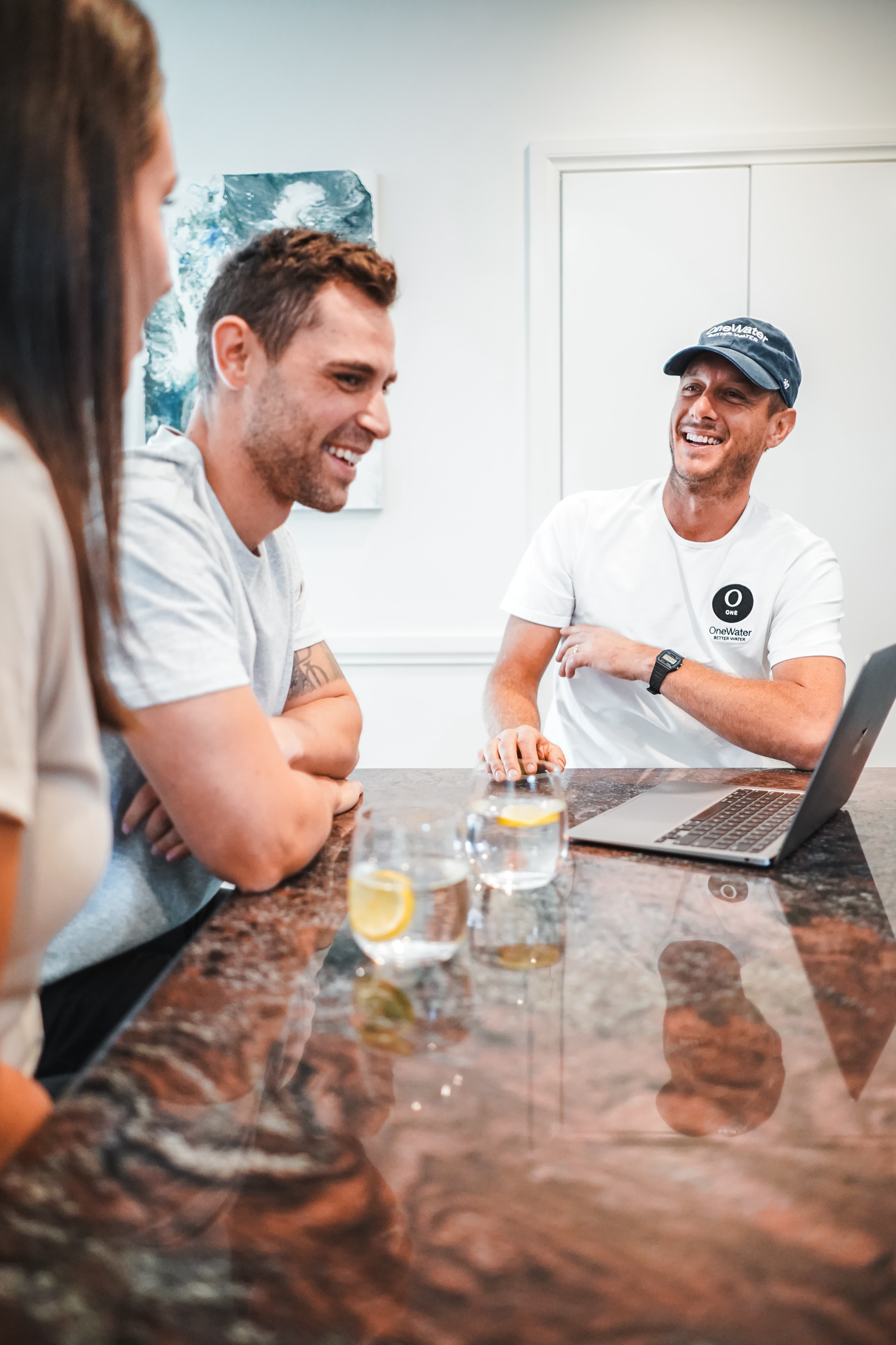 OneWater specialist chatting with happy customers