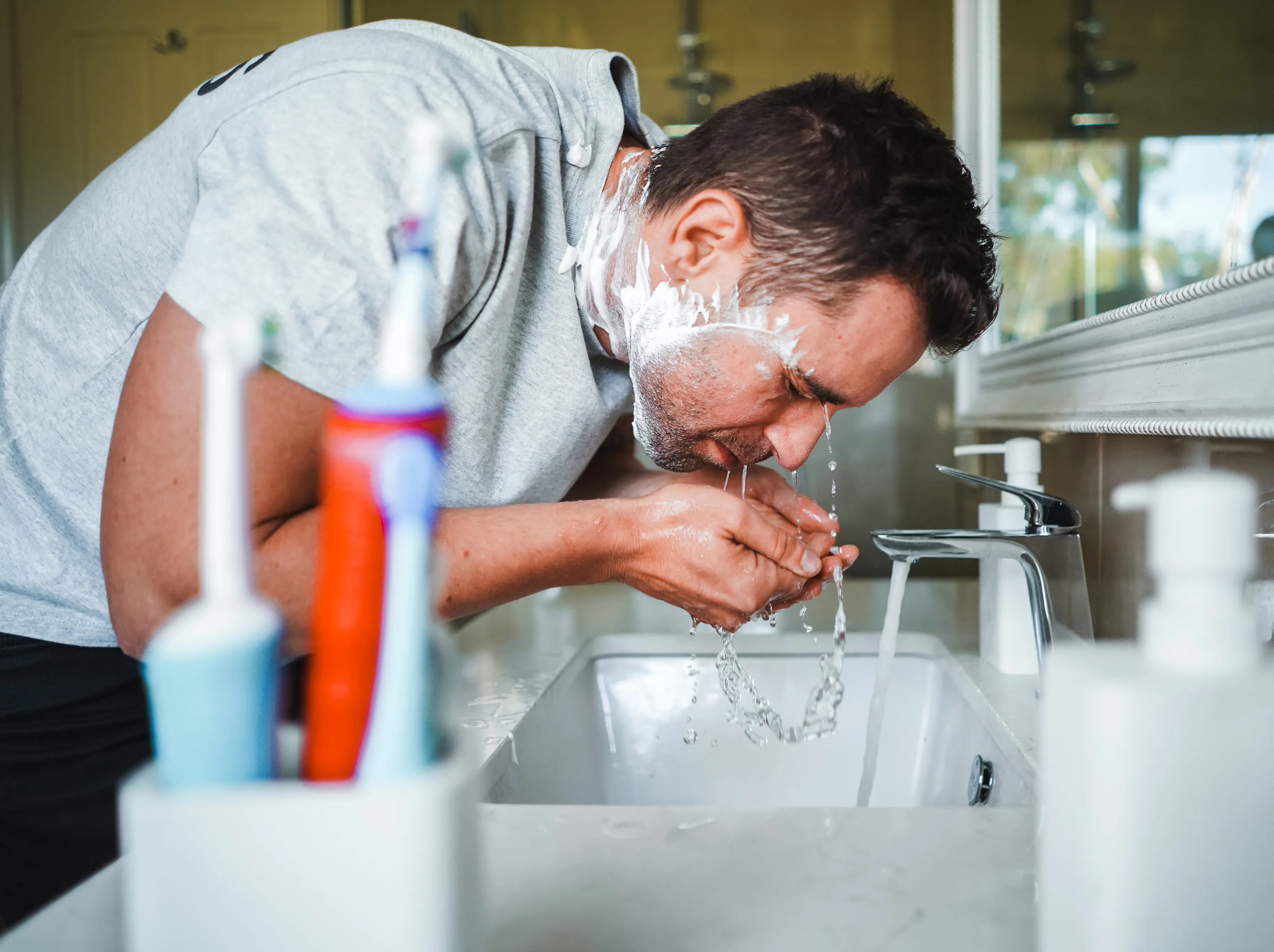 Family enjoying filtered water in a kitchen